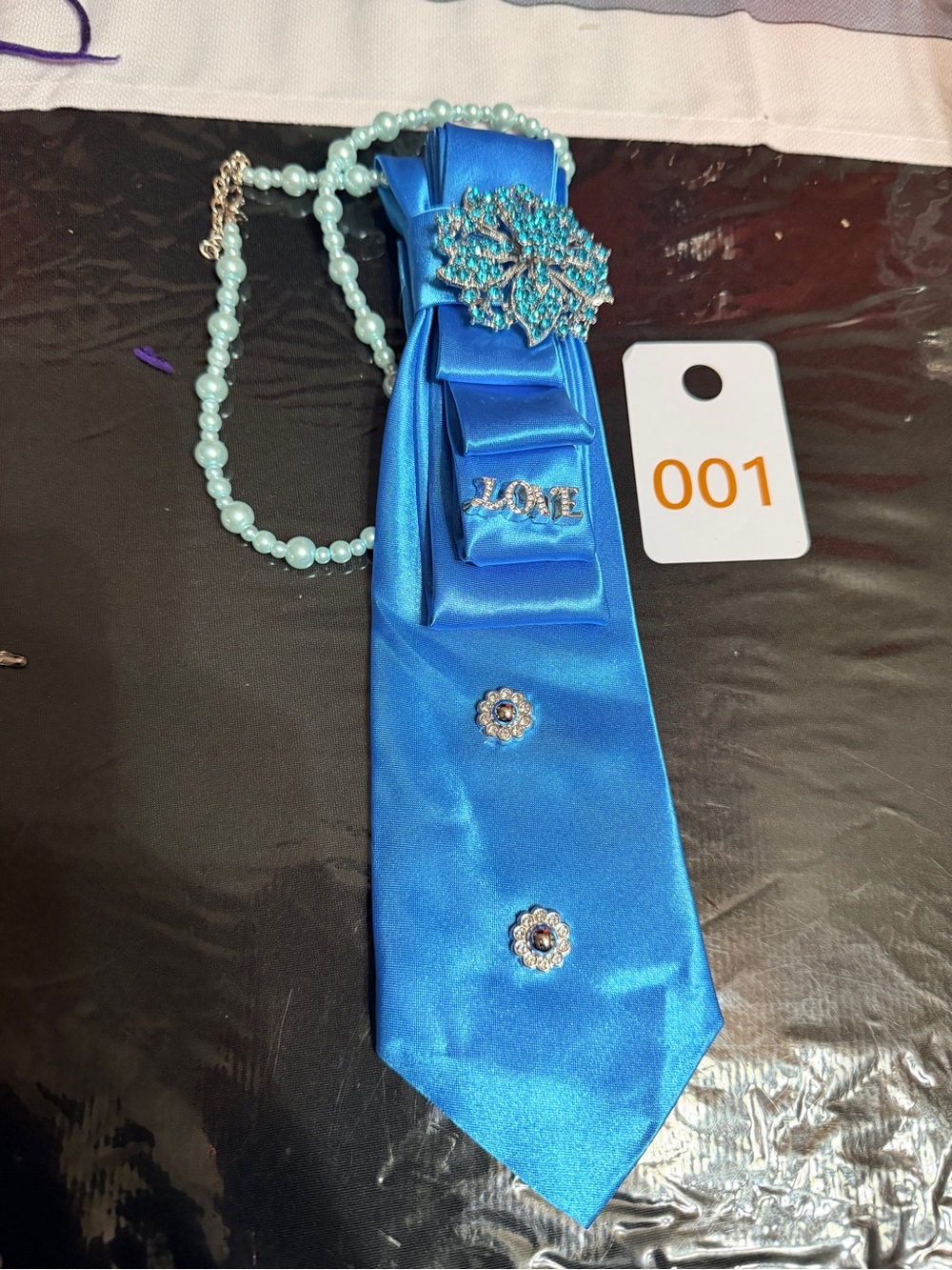 Repurpose necktie necklace